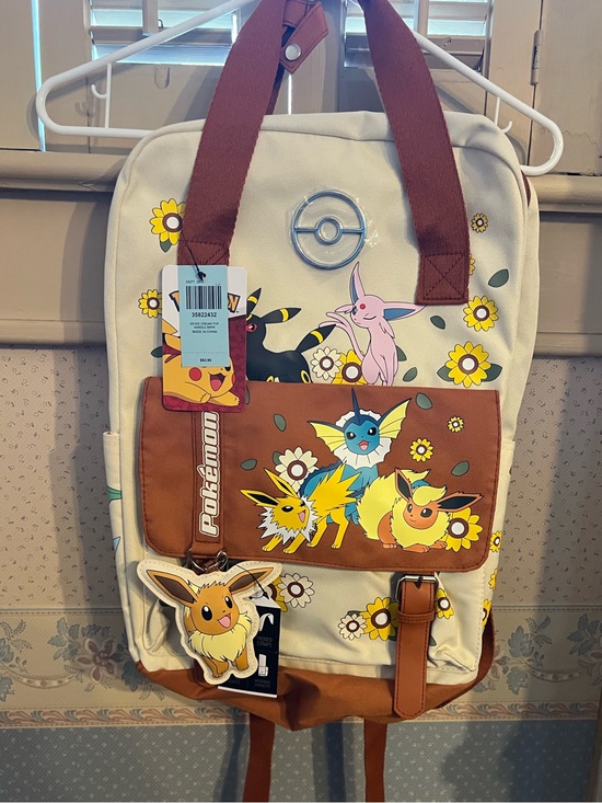 Pokemon Handbags - Pokemon Eeveelutions Floral Backpack in Cream, Brown, Yellow, Blue, Pink